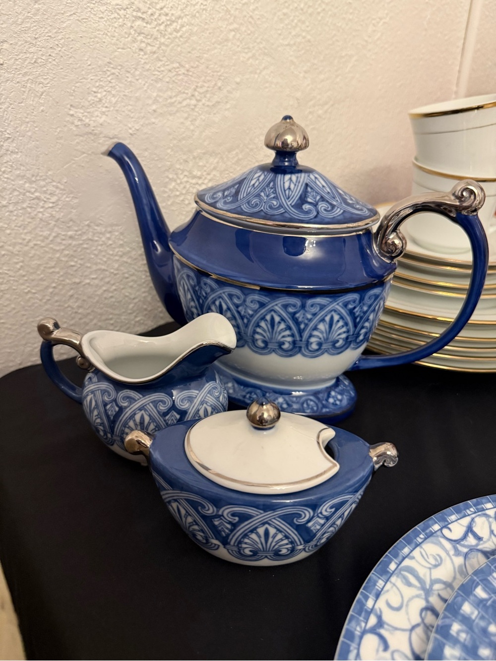 Blue and White Ceramic Teapot Set with Silver Accents
